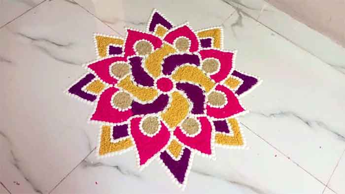 Colored rice rangoli design