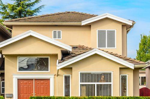 yellow cream indian house exterior paint